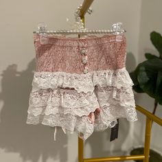 Ruffle Shorts Size M Super Stretchy To Fit And Get On But It Also Snugs And Hugs The Waist Material: Polyester Color: Pink Pink Lace Bottoms For Spring, Cute Ruffled Shorts For Loungewear, Lace Ruffle Bottoms For The Beach, Beach Lace Bottoms With Ruffles, Lace Ruffle Bottoms For Beach, Lace Ruffle Beach Bottoms, Lace Ruffled Beach Bottoms, Pink Ruffled Shorts For Loungewear, Cute Lace Bottoms For Spring