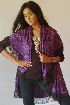 ZZ126 PLUM//JACKET-WRAP-M L 1X 2X-FRINGED-2-HOLE-BATIK-SHAWL-COLLAR * SIZE: Tagged OS WILL FIT M L XL 1X AND POSSIBLY 2X- PLEASE CHECK THE SPECS TO BE SURE THIS WORKS FOR YOU * FABRIC: 100% 1ST QUALITY RAYON BATIK * MEASUREMENTS 43" length, 48" bust, 22" armhole, 50" hips CONDITION : NEW WITH TAGS MADE IN: BALI,INDONESIA DESCRIPTION: Wow! What a creative, innovative new style! Annie's created a stylish new jacket design that's an authentic fashion gem. When you slip this one on, you'll feel the Bohemian Shawl For Fall Layering, One Size Bohemian Purple Outerwear, Purple Shawl For Fall, Bohemian Purple Outerwear For Festivals, Fitted Bohemian Purple Outerwear, Fitted Purple Bohemian Outerwear, Fitted Bohemian Outerwear With Tassels, Bohemian Fall Scarves With Tassels, Purple Bohemian Scarves For Winter