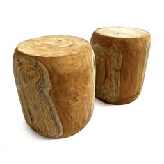 two wooden stools sitting next to each other