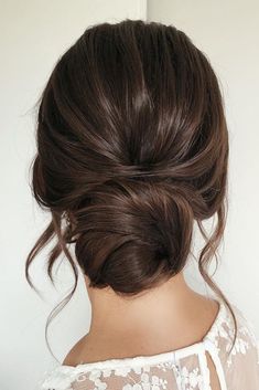 Updo Loose Curls Low Buns, Bridal Hair Updo How To, Low Piecey Bun, Wedding Updo Brunette Classy, Loose Wedding Bun Hair, Low Pinned Hair Wedding Updo, Bridal Low Bun Dark Hair, Low Wispy Bun Wedding, Dark Hair Formal Hairstyles