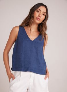 Elevate your summer wardrobe with our Sleeveless Button Back V-neck top, perfect for a casual yet stylish look.  Pair it with  shorts or cropped pants for a cool and effortless outfit that will keep you comfortable all day long.  100% Linen SIZE CHEST SHOULDER TO HEM XS 36" 20 3/8" S 38" 21" M 40" 21 5/8" L 42" 22 1/4" Effortless Outfit, Bella Dahl, V Neck Tops, Summer Wardrobe, Ghana, Cropped Pants, Pullover Styling, New Arrivals, V Neck