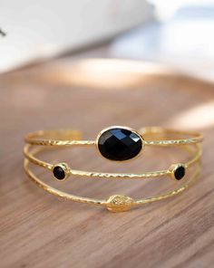 》D E T A I L S《 ✦ M E T A L : 18k Gold Plated ✦ S T O N E : Black Onyx ✧ Please note natural gemstones are unique and may vary in shape or color. ✧ ✦••✧••✦••✧••✦••✧••✦••✧••✦••✧••✦••✧••✦••✧••✦••✧••✦••✧••✦ 》✦ $•$•$ S A V E • B U Y • M O R E $•$•$ ✦《 Use the code MARESIA2 and get 10% OFF when you buy 2 items. Use the code MARESIA3 and get 15% OFF when you buy 3 or more items. ✦••✧••✦••✧••✦••✧••✦••✧••✦••✧••✦••✧••✦••✧••✦••✧••✦••✧••✦ 》 P A C K A G I N G 《 Your jewelry will be nicely packaged. If one o Black And Gold Jewelry, Bracelet Gold, Adjustable Bracelet, Black Onyx, Natural Gemstones, Onyx, Gold Jewelry, Gold Bracelet, 18k Gold