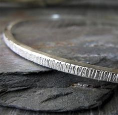 Hand Forged Sterling Silver Minimalist Bracelets, Minimalist Silver Hammered Bangle, Minimalist Hammered Sterling Silver Bangle, Minimalist Hand Forged Sterling Silver Bracelets, Minimalist Hammered Silver Bangle, Minimalist Hammered Sterling Silver Bangle Bracelet, Minimalist Hand Forged Sterling Silver Bracelet As Gift, Sterling Silver Hand Forged Bangle As Gift, Hand Forged Sterling Silver Bangle Bracelet