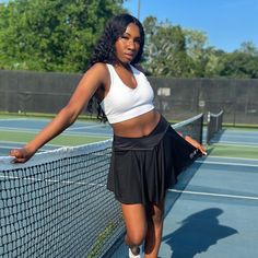 Take Your Fashion Game To The Highest Level With This Extraordinary Criss-Cross Black Tennis Skirt! Ideal For Golfing, Tennis, Running, Or Relaxing, This Hip-Hugger Comes With An Inner Short And Pocket For Your Phone Or Ball. Don't Miss Out, Now Is The Time To Perfect Your Backhand With Charming Mesh Style! Model Is Wearing Size: Medium 90% Polyester 10% Spandex White Skater Skirt, Black Tennis Skirt, Black Suspenders, Poodle Skirt, Gingham Skirt, Pleated Tennis Skirt, Black And White Skirt, Suspender Skirt, Now Is The Time