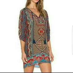 Price Firm Time To Get 'Festival' Ready With This Awesome Hippie Boho Chic Ethnic Mini Dress With 3/4 Sleeves And Tassel At Neckline. Measured Laying Flat Small Bust 18.5" Length 32" Large Bust 20.5" Length 32" 87% Cotton, 13% Acetate Has A Satiny Feel. No Stretch. Patterned Bohemian Dress, Multicolor Bohemian Boho Dress With Paisley Print, Multicolor Boho Print Folk Dress, Multicolor Bohemian Dress With Paisley Print, Multicolor Folk Boho Dress With Boho Print, Folk Style Multicolor Boho Print Dress, Multicolor Folk Style Boho Dress, Bohemian Mini Dress With Vibrant Print, Bohemian V-neck Tunic With Floral Print