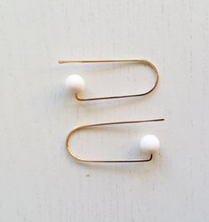 CURVE_W | white earrings, gold earrings, loop earrings, minimalist, modern jewelry, shpere earrings, Minimalist 14k Gold Filled Circle Earrings, Nickel Free Minimalist 14k Gold Filled Earrings, Minimalist Round Linear Earrings For Everyday, Minimalist White Linear Earrings For Pierced Ears, Simple White Drop Earrings, White Modern Jewelry Simple Design, White Modern Jewelry With Simple Design, Modern White Jewelry With Simple Design, Modern Simple White Jewelry