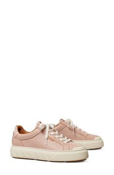 Signature branding and mixed textures lend a street-savvy aesthetic to a low-profile sneaker grounded by a classic rubber sole. removable insoles Leather and textile upper/leather lining/rubber sole Imported Shell Pink, Low Profile, Womens Sneakers, Tory Burch, Rubber Sole, Fashion Inspo, Nordstrom, Branding, Sneakers