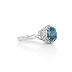 Indulge in the mesmerizing allure of this 4.16 Cts Blue Zircon and White Diamond Ring. Crafted in 14K white gold, this exquisite piece showcases a stunning blue zircon gemstone, radiating with brilliance and elegance. Adorned with shimmering white diamonds, this timeless design is a true symbol of sparkle and beauty. Blue Topaz Ring In 14k White Gold, Luxury Blue Topaz Ring With Brilliant Cut, Dazzling Blue Diamond Ring With Brilliant Cut, Dazzling Blue Brilliant Cut Diamond Ring, Dazzling Blue Diamond Cut Ring, Dazzling Blue Diamond Ring With Prong Setting, Blue Diamond Birthstone Ring With Accents, Blue Diamond Birthstone Ring With Diamond Accents, Blue Aquamarine Diamond Ring With Brilliant Cut