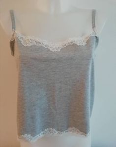 Grey pyjamas set  Cotton jersey  Pyjamas for Womens  lounge wear womens PJ Gift for her Girlfriend gift Women's marl grey Pyjamas set made with  soft cotton jersey fabric, PJ bottom length is three quarter legs length,  spagetti shoulder adjustable strap, trimmed with  cream lace Please follow this link for more listings. https://www.etsy.com/uk/shop/Rosevershelvt Size: 8-10 UK (Small)          36-38 EU (Small)             4-6 US (Small) Size: 12-14 UK (Medium)          40-42 EU (Medium)             8-10 US (Medium) Please carefully check the sizing chart for approximate size to go for. Care Instructions: machine washable 40o Casual Camisole Sleepwear For Loungewear, Stretch Cami Sleepwear For Loungewear, Casual Loungewear Sets With Lace Trim, Gray Cotton Sleepwear For Loungewear, Cotton Top With Lace Trim For Loungewear, Cotton Tops With Lace Trim For Loungewear, Cotton Lace Trim Top For Loungewear, Gray Cotton Sleepwear For Bedtime, Cotton Camisole Tops For Lounging