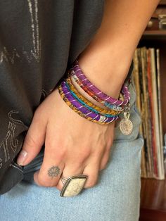 Stack up on these colorful & bold boho bangles!  I wrap each bracelet by hand with unique upcycled sari silk and finish with a wire wrap to secure.  Add vintage kuchi coin charms to a few or all to complete the look, These bracelets are a super simple and lightweight for easy, comfortable wear. Select one or mix and match to create your own personalized set! ★ Handmade ★ Upcycled Sari Silk ★ Non-Tarnish Wire ★ Vintage Kuchi Coin Charm ★ 65mm inner diameter ✉ Message for Custom Requests ✈ Free Sh Boho Bangles, Sari Silk Jewelry, Bold Boho, Bracelets Unique, Boho Bangle, Silk Jewelry, Bracelet Stacking, Jewelry Hand, Stacked Bangles