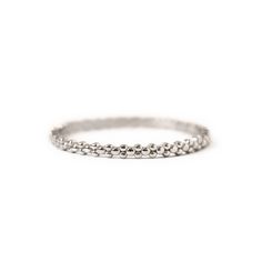 description Dainty beaded Silver eternity rings perfect for stacking. Comfortable to wear for everyday! end description materials .925 Sterling Silver Hypoallergenic, lead and nickel free end materials details Width: 1.7mm end details sku #R110 end sku Adjustable Hypoallergenic Stackable Rings For Everyday, Hypoallergenic Adjustable Stackable Rings For Everyday, Classic Silver Eternity Band For Everyday, Adjustable Round Stackable Eternity Band, Adjustable Stackable Round Eternity Band, Stackable White Gold Eternity Band For Everyday, Nickel Free White Gold Stackable Rings, Nickel-free White Gold Stackable Rings, Stackable Adjustable Eternity Band