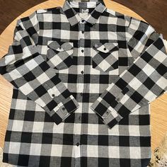 Branded Bills Flannel Shirt. Never Worn, Excellent Condition Black Relaxed Fit Flannel Shirt, Black Relaxed Fit Casual Flannel Shirt, Black Relaxed Fit Flannel Shirt Casual, Black Relaxed Fit Button-up Flannel Shirt, Casual Black Flannel Shirt For Winter, Black Button-up Casual Flannel Shirt, Classic Black Flannel Top, Black Cotton Relaxed Fit Flannel Shirt, Black Long Sleeve Flannel Shirt