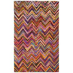 a multicolored rug with wavy lines on it