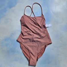 Light Pink Peach Colored High Leg One-Piece Swimsuit, Bathing Suit. Brand New With Tags & Inner Liner, Never Tried On. Basic One Piece With Plain Front, Criss Cross Back Straps, Has Criss Crossing At Back That Is Sexy & Stylish. Size M. Brand Is Pacsun. Perfect For The Beach & Pool. Very Flattering Style & Cut, High Leg Cut. See Photos For The Best Visual Reference. All Sales Are Final. Ready To Ship. Pink Stretch Bodysuit For Sunbathing, Pink Stretch One-piece For Sunbathing, Pink One-piece Bodysuit For Poolside, Pink Lined Bodysuit For Swimming, Pink Sleeveless One Piece For Pool, Sleeveless Pink One Piece For Pool, Sleeveless Pink One-piece For Pool, Pink Stretch One-piece Swimsuit For Vacation, Pink Stretch Vacation Swimsuit