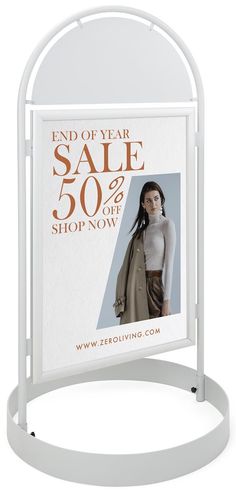 a white sign that says end of year sale 50 % off with an image of a woman