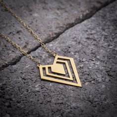 Geometric necklace gold diamond necklace diamond shape by ByYaeli Gold Geometric Metal Jewelry, Gold Triangle Metal Jewelry, Minimalist Metal Heart Pendant Jewelry, Minimalist Everyday Diamond-shaped Jewelry, Minimalist Diamond-shaped Everyday Jewelry, Minimalist Triangle Metal Necklace, Modern Metal Jewelry For Valentine's Day, Everyday Minimalist Diamond-shaped Jewelry, Gold Triangle Brass Jewelry