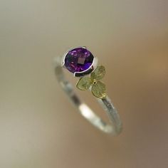 amethyst ring with tiny cast gold hydrangea blossom, so sweet and delicate. Exquisite Amethyst Ring, Elegant Purple Amethyst Birthstone Ring, Exquisite Amethyst Ring For Anniversary, Elegant Amethyst Ring For A Gift, Elegant Purple Amethyst Ring For Gift, Elegant Purple Amethyst Bezel Setting Ring, Elegant Purple Amethyst Ring With Bezel Setting, Delicate Amethyst Ring As Gift, Dainty Purple Amethyst Ring