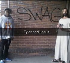 two men standing next to each other in front of a brick wall with the words swag written on it