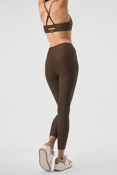 Wondering why these leggings are a fan favorite? Maybe it’s the sculpting, subtly sheeny, high-compression Airlift fabric. Or the fact that they fit like a glove, complete with a wide, double-layered waistband for a holds-you-in feel. Or the ⅞ length hems that are perfect for petites or an above-the-ankle fit. Pick your color and get ready to wear yours on repeat. Versatile Micro-elastic Bottoms By Alo Yoga, High Waist Sculpting Athleisure Leggings, High Waist Sculpting Leggings For Athleisure, Athleisure High Waist Sculpting Leggings, Alo Yoga Stretch Athleisure Yoga Pants, Alo Yoga Fitted Leggings For Pilates, High Stretch Sporty Pants By Alo Yoga, Compressive Smoothing Yoga Pants In Athleisure Style, Alo Yoga Stretch Leggings