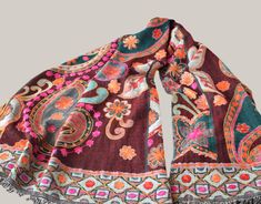 Amazing handmade embroiderd shawl. Colorful woolen indian scarf. + Unique and exclusive embroidered shawl for a ceremony, wedding or party. +` Fully embroidered by hand with a floral design and in very bright colors' + Great accessory to any dress and occasion.  + Fabric:           100% wool Size:               70cm x 200cm // 27,3" x 78" Dry clean + Note that the colors of the original product may vary slightly from those you see on the computer screen. For any questions you may have contact wi Multicolor Embroidered Shawl Scarf, Multicolor Embroidered Shawl Scarves, Bohemian Embroidered Winter Shawl, Bohemian Multicolor Embroidered Festive Pashmina Shawl, Bohemian Festive Pashmina Shawl With Multicolor Embroidery, Bohemian Embroidered Dupatta Scarf, Bohemian Brown Dupatta With Motifs, Bohemian Embroidered Winter Pashmina Shawl, Bohemian Handloom Scarf For Winter