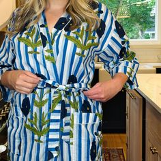 Start your morning off right! Slip into one of our bright & cheery robes while you prepare for your day. This 100% cotton robe features a vibrant Indian block print, in a rich, bold pattern of floral and blue stripes, finished off with white piping trim. Other details include 3/4 length sleeves, pockets and tying-sash. One size fits most. Details: Made in India Fabric: 100% cotton 3/4 length sleeves Pockets Includes tying-sash India Fabric, Printed Kimono, Indian Block Print, Cotton Kimono, Print Kimonos, Floral Stripe, Toiletry Bags, Blue Stripes, Blue Floral