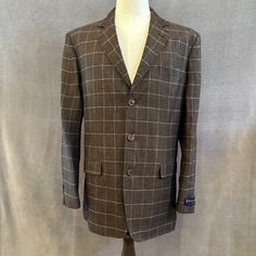 Brown Silk/Linen Window Pane Patterned Unconstructed 3-Button Sport Coat With Fully Finished Inseams, Working Button Cuffs, And Functional Interior Pocket System Incl Zippered Security Pocket And Smart Phone Accessories System. Size Lg. New. Semi-formal Fall Button-up Suits, Fall Button-up Suits With Button Closure, Single Breasted Button-up Suit For Fall, Casual Long Sleeve Suits With Buttons, Casual Suits With Lapel Collar And Buttons, Single-breasted Tweed Jacket For Business Casual, Tailored Single Breasted Button-up Tweed Jacket, Tailored Single Breasted Tweed Jacket, Brown Long Sleeve Suit With Buttons