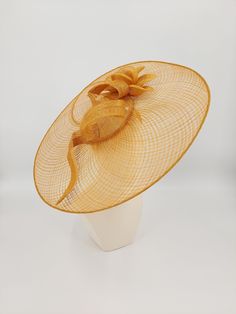 Stunning wide brimmed fascinator in goldenrod Gold Brimmed Straw Hat For Kentucky Derby, Gold Wide-brim Straw Hat For Kentucky Derby, Gold Wide Brim Straw Hat For Kentucky Derby, Gold Brimmed Mini Hat For Royal Ascot, Gold Brimmed Mini Hats For Church, Gold Brimmed Mini Hat For Evening, Chic Gold Hat For Kentucky Derby, Gold Wide Brim Mini Hat For Evening, Chic Gold Straw Hat With Short Brim