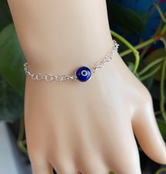 Very Cute bracelet for Babies with Evil Eye  Center . Perfect Gift for babies from New born to 1 year old  Bracelet Length : 5 inches Adjustable Hypoallergenic Sterling Silver Bracelet With Round Beads, Nickel Free Spiritual Jewelry For Birthday Gift, Spiritual Silver Jewelry For Birthday Gift, Nickel-free Spiritual Jewelry For Birthday Gift, Personalized Blue Sterling Silver Bracelets, Silver Beaded Birthstone Bracelet As Gift, Adjustable Sterling Silver Charm Bracelet With Round Beads, Hypoallergenic Bracelet Jewelry For Birthday Gift, Sterling Silver Bracelet Jewelry For Birthday