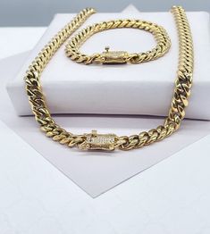 "18k Gold Filled Original 8mm Miami Cuban Link Necklace and Bracelet featuring Zirconia Box Clasp Necklace 16\" Bracelet 7\" Buy with confidence we add insurance to every shipping package. Our Etsy store was developed to help you find the most unique styles of modern designs, always looking for elegance and market trends. Here you will find ways to better make your jewelry through quality, seeking harmony, exclusivity and impeccable finish. Find many more styles in our Milie Jewelry Etsy Store. Miami Cuban Link Bracelet, Iphone Storage, Cuban Link Necklace, Modern Gold Jewelry, Miami Cuban Link Chain, Miami Cuban Link, Miami Cuban, Box Clasp, Market Trends