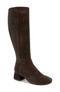 A stretchy back panel offers a comfortable fit on a knee-high boot grounded by a cushioned footbed and durable rubber sole. 1 3/4" heel 15 1/4" shaft; 9 1/4" calf circumference. Narrow calf Side zip closure Memory foam cushioning PORON®-cushioned insole with arch support Leather upper and lining/rubber sole Imported Chocolate Brown Boots, Chocolate Leather, Mens Shoes Black, Sneaker Dress Shoes, Boot Brands, Calf Boots, Tall Boots, Kenneth Cole, Brown Boots