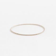 The Classic Twist – Yearly Company Minimalist Twisted Yellow Gold Jewelry, Minimalist Twisted Jewelry For Anniversary, Yellow Gold Twisted Stackable Jewelry, 14k Gold Twisted Jewelry For Anniversary, Twisted 14k Gold Jewelry For Anniversary, Anniversary 14k Gold Twisted Jewelry, Dainty Stackable 14k Gold Bangle, Dainty 14k Gold Stackable Bangle, 14k White Gold Stackable Bracelet