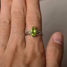 This is a gorgeous handmade creation. Its beauty is its simplicity & Elegance. The 6*12 mm marquise shape faceted natural Peridot is crafted in solid sterling silver and with rhodium plated. Main stone weight about 1.9 ct. All item is sent in a beautiful gift box If you have any idea of design your ring,pls contact me directly. You can realize more lovely stuff clicking the link https://www.etsy.com/shop/knightjewelry?refshopsection_shophome_leftnav Please leave the correct address and you p Oval Peridot Gemstones For Anniversary, Sterling Silver Marquise Gemstone Rings, Oval Peridot Solitaire Jewelry, Classic Marquise Jewelry For May Birthstone, Green Gemstone Ring With Marquise Cut, Green Marquise Cut Gemstone Ring, Classic Marquise May Birthstone Jewelry, Green Marquise Birthstone Ring, Green Marquise Birthstone Jewelry