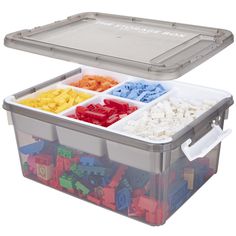 a plastic storage box filled with lots of legos