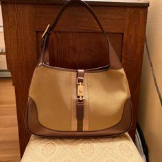 This Is Such An Adorable Mini Bag, Never Got The Chance To Use It!! Tag Is Still On!! Gucci Brown Shoulder Bag With Leather Trim, Everyday Gucci Shoulder Bag With Leather Trim, Chic Gucci Bags With Leather Trim, Beige Gucci Shoulder Bag With Branded Hardware, Brown Top Handle Shoulder Bag With Horsebit Detail, Gucci Beige Bags With Gold-tone Hardware, Brown Shoulder Bag With Horsebit Detail, Brown Horsebit Shoulder Bag, Brown Gucci Shoulder Bag With Branded Hardware