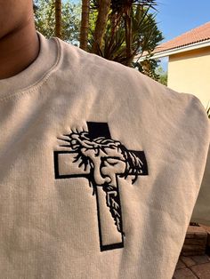 Embroidered Jesus Christ Cross Unisex sizing  Heavy Cotton Gildan Can be down in any color upon request if no color requested will be done in the color of sellers choice. Church Shirt Designs, Jesus Clothing, Christian Clothes, Christ Shirts, Christian Clothing Brand, Jesus Christ Cross, Jesus Clothes, Christ Cross, Jesus Artwork