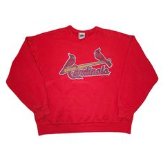 "Vintage Lee Sport St. Louis Cardinals Sweatshirt / Red / Men's Large / faded Cardinals graphic  Material: 50% cotton, 50% polyester Tag size: Large Fits like: Men's Large Made in: Honduras Measurements: -chest (pit to pit): 25.5\" -shoulders: 24\" across -sleeve (shoulder seam to end of cuff): 21.5\" -length (top of shoulder to bottom hem): 25.5\" Condition: Faded graphic, well worn, distressed cuffs, good condition -SOLD AS IS- Please check measurements for sizing and condition for flaws and distressing before purchasing, this item is sold AS IS. -NO RETURN OR EXCHANGES- Items are vintage or pre-loved and will show normal vintage wear. Significant flaws or distressing shown in pictures. If you need further measurements please send a message, we are happy to provide more info" Red Sweatshirt With Embroidered Graphics For Streetwear, Red Embroidered Sweatshirt For Streetwear, Red Crew Neck Sweatshirt For Fan Merchandise, Red Sweatshirt For Sports Season Fan Merchandise, Red Sweatshirt For Sports Fan Merchandise, Red Crew Neck Sweatshirt For Fans, Vintage Red Sweatshirt For Streetwear, Red Fan Apparel Sweatshirt For Streetwear, Red Sweatshirt For Streetwear, Fan Apparel