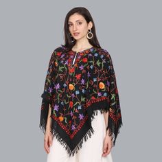 Stunning Kashmiri Embroidered Handcrafted Woolen Black Multi Color Poncho Free Size Original Product of Kashmir Fall Folk Embroidered Poncho, Traditional Poncho With Floral Embroidery, Winter Festival Embroidered Poncho, Traditional Embroidered Shawl Poncho, Traditional Embroidered Winter Poncho, Traditional Embroidered Poncho For Winter, Festival Poncho With Multicolor Floral Embroidery, Traditional Black Shawl Outerwear, Traditional Embroidered Floral Poncho