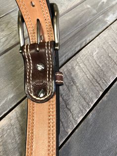 Custom made to fit any size! SPECS: HAND-MADE with detail, from our hands to yours LEATHER-Full-Grain, 9oz WIDTH-1.5"- can be made to 1.25" width upon request HARDWARE-Chicago screws so buckles can be interchanged Our DOUBLE-STITCHED LEATHER BELTS are perfect for carrying a GUN HOLSTER on the hip or just to have a thick, durable belt. These belts are made from vegetable-tanned FULL GRAIN leather that we spray dye in three colors: BROWN, DARK BROWN, and BLACK. We strip two pieces of 7-8 leather a Leather Belt Buckles With Removable Belt For Everyday Use, Leather Belt Buckle With Removable Belt For Everyday Use, Rugged Brown Leather Belts And Suspenders, Rugged Brown Leather Strap Belt, Adjustable Leather Belts For Everyday, Everyday Leather Adjustable Belt, Adjustable Leather Belt Buckles With Leather Strap, Adjustable Brown Bridle Leather Belt Buckles, Everyday Bridle Leather Belts And Suspenders With Removable Belt