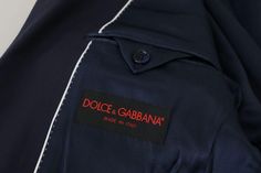 DOLCE & GABBANA Gorgeous brand new with tags 100% Authentic Dolce & Gabbana Blazer. Colour: Blue Model: Single breasted one piece formal jacket blazer coat Material: 96% Wool 4% Silk Inner Lining: 53% Cupro 47% Viscose Two front button closure Two front pockets Logo details Made in Italy Designer Suits With Button Closure, Designer Fitted Navy Blazer, Silk Crafts, Formal Coat, Formal Blazer, Formal Jacket, Dolce And Gabbana Blue, Modern Gentleman, Dolce E Gabbana