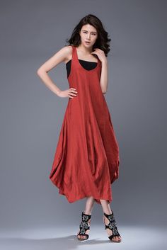 Super feminine and comfortable, this casual red linen dress is a must-have for any summer wardrobe. Wear it with chunky boho jewelry for a casual look and relaxed vibe. Youll create an entrance wherever you go with this incredibly versatile linen dress. Sleeveless, loose-fitting and flaunting a gorgeous tulip-shaped hemline, the dress is suitable for any shaped lady. This is a really versatile but unique designer dress.  You may also like this sleeveless gray linen dress here: https://www.et... Summer Bohemian Linen Dress, Red Linen Bohemian Dress, Bohemian Linen Summer Dress, Red Bohemian Linen Dress, Solid Color Bohemian Linen Dress, Casual Red Linen Beach Dress, Red Linen Dress For Spring, Red Linen Summer Beach Dress, Casual Red Linen Dress