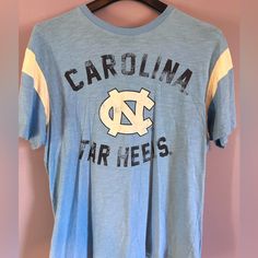 Never Worn/Like New Condition. Unc Cute T-Shirt. Blue Spring College Tops, Light Wash Graphic Tee With Crew Neck, Casual Blue Tops For College, Blue Pre-shrunk Tops For Spring, Casual Light Wash Graphic Print Tops, Light Blue Crew Neck T-shirt With Graphic Print, Graphic Crew Neck T-shirt, Light Wash Graphic Print Crew Neck T-shirt, Light Wash Crew Neck T-shirt With Letter Print