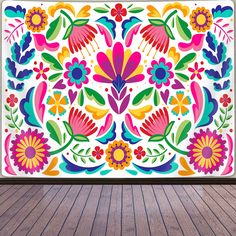 an image of a colorful floral design on a wall in a room with wood flooring