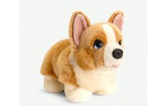 a brown and white stuffed dog with blue eyes