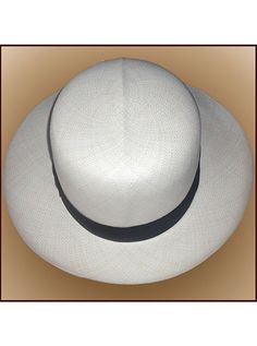 Brand: Gamboa Color: Natural Material: Toquilla Straw Brim: 8 cm. (3 1/10")Grade: 13 - 14 (Fine Fine)learn more Sweatband: Cotton Twill, 3 cm. (1.18") Crown: 11 cm. (4 1/3") Ribbon: Linen Description: A luxurious hat, handmade in Montecristi, the worldwide famous Panama Hat town in Ecuador. This Panama Colonial (Optimo) hat is a top quality, classic and elegant hat. Each hat is individually blocked and trimmed to meet the highest quality standards.Roll Up White Brimmed Panama Hat For Formal Occasions, White Formal Panama Hat, Classic White Hat With Flat Crown, Classic White Flat Crown Hat, Elegant Formal Panama Hat With Flat Crown, Elegant White Hat With Flat Crown, Classic White Straw Hat With Flat Crown, Classic White Flat Crown Straw Hat, Fitted Panama Hat With Flat Crown For Formal Occasions