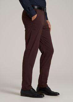 About Our Men's Tall Pants These extra-long chinos strike the perfect balance between classic and comfortable. They're designed to look like a pair of tapered chinos but are made of a lighter stretchy fabric that provides plenty of room for movement so you can tee off on the golf course, take the dog for a walk or grab dinner with friends at that new restaurant in town. We know how hard it is to find men's tall pants, which is why we made sure this pair had an extra-long inseam measured specific Burgundy Chinos, Scrubs Dress, Tapered Chinos, Athleisure Summer, Cozy Sleepwear, Chino Pants Men, Tall Men, New Restaurant, Tall Pants