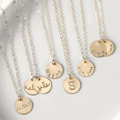 · 1/2" (12.7mm) disc· 14k yellow gold fill, 14k rose gold fill, and sterling silver options· Sturdy, timeless, and built to be worn everydayOur classic 1/2” necklaces are easy to layer, elegant, and ready to be personalized with your most special sentiments, moments, and memories! Created to last a lifetime, these necklaces will remain evergreen even as the years and trends come and go.Personalizing your piece with a message? Reference our fonts and symbols chart for font options and character m Customizable Minimalist Rose Gold Charm Necklace, Everyday Medallion Jewelry For Mother's Day, Personalized 14k Gold Necklace For Everyday, Classic Everyday Customizable Necklaces, Customizable Minimalist Rose Gold Necklace, Classic Everyday Customizable Necklace, Minimalist Customizable Rose Gold Necklace, Everyday Gold Coin Necklace In Sterling Silver, Minimalist 14k Gold Filled Necklace For Personalized Gift