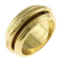 Used Piaget Possession Ring, Size 13, 18k Gold, For Women, Piaget (Sku: Gzl13gtl) === General === Brand : Piaget === Design === Type : Band Ring Gender : Women Color : Yellow Gold Material : Yellow Gold (18k) Handmade : Yes Season : Fall/Winter, Spring/Summer === Size === Other Size : 13 Width : 9mm / 0.35'' Weight : 3.3g / 0.11oz. === Included Items === Accessories Notice : Before Purchasing, Please Refer To The Images Of The Accessories Included With The Item. === Condition === Condition : Use Piaget Possession, Gold For Women, Gold Material, Woman Colour, Band Ring, Size 13, Band Rings, 18k Gold, Ring Size