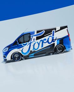 a blue and white van with the word ford painted on it