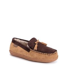 When temps start to drop stay warm with the Men's Leather Goods by MUK LUKS® Talan Moc Slipper. 100% cow suede upper in a slipper style with a moc toe. Slip on entry. 100% Polyester vamp. Color may vary due to natural variance in leather. 80% Polyester 20% wool blend lining and insole. Cushioned foam footbed. Wipe with a damp cloth to clean no bleach lay flat to dry. Durable TPR outsole. Mens Moccasin Slippers, Slippers Brown, Moccasin Slippers, Moccasins Slippers, Famous Footwear, Slipper Shoes, Mens Slippers, Leather Goods, Moccasins