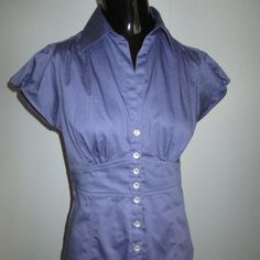 Banana Republic Cotton Spandex Purple Puff Sleeve Fitted Button Front Blouse. Fitted V-neck Blouse With Buttons, Stretch Office Blouse With Buttons, Fitted Purple Padded Blouse, Stretch Collared Blouse With Buttons, Stretch V-neck Blouse With Buttons, Fitted Padded Button-up Blouse, Fitted V-neck Top With Back Button Closure, Short Sleeve Stretch Blouse With Buttons, Stretch Short Sleeve Blouse With Buttons